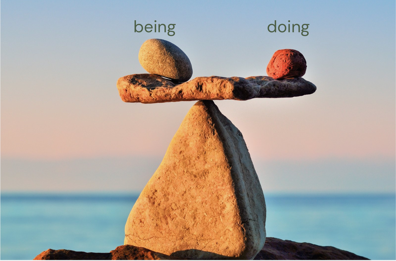 Balanced rocks representing being and doing in harmony