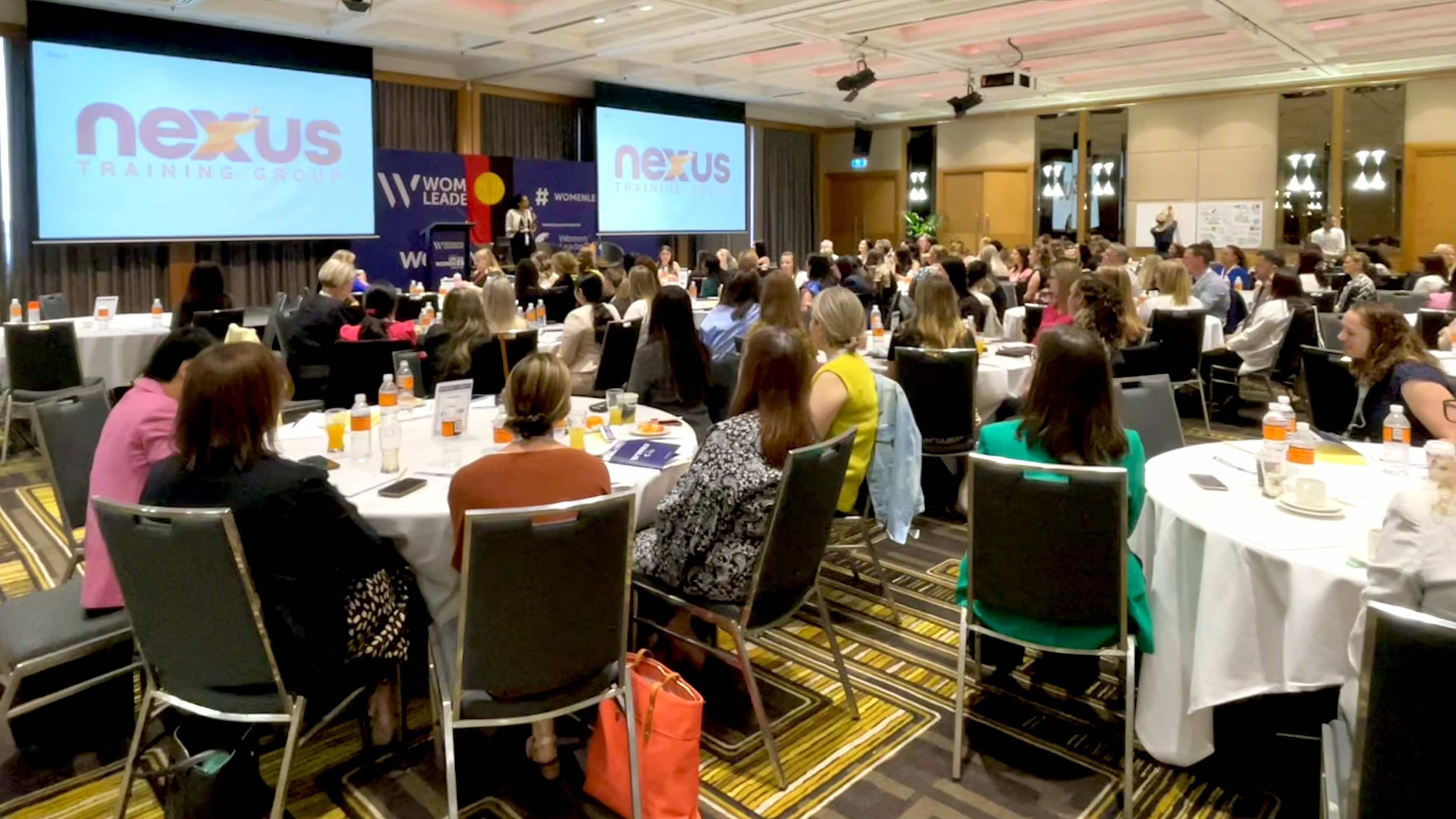 Usha speaking at a corporate leadership conference